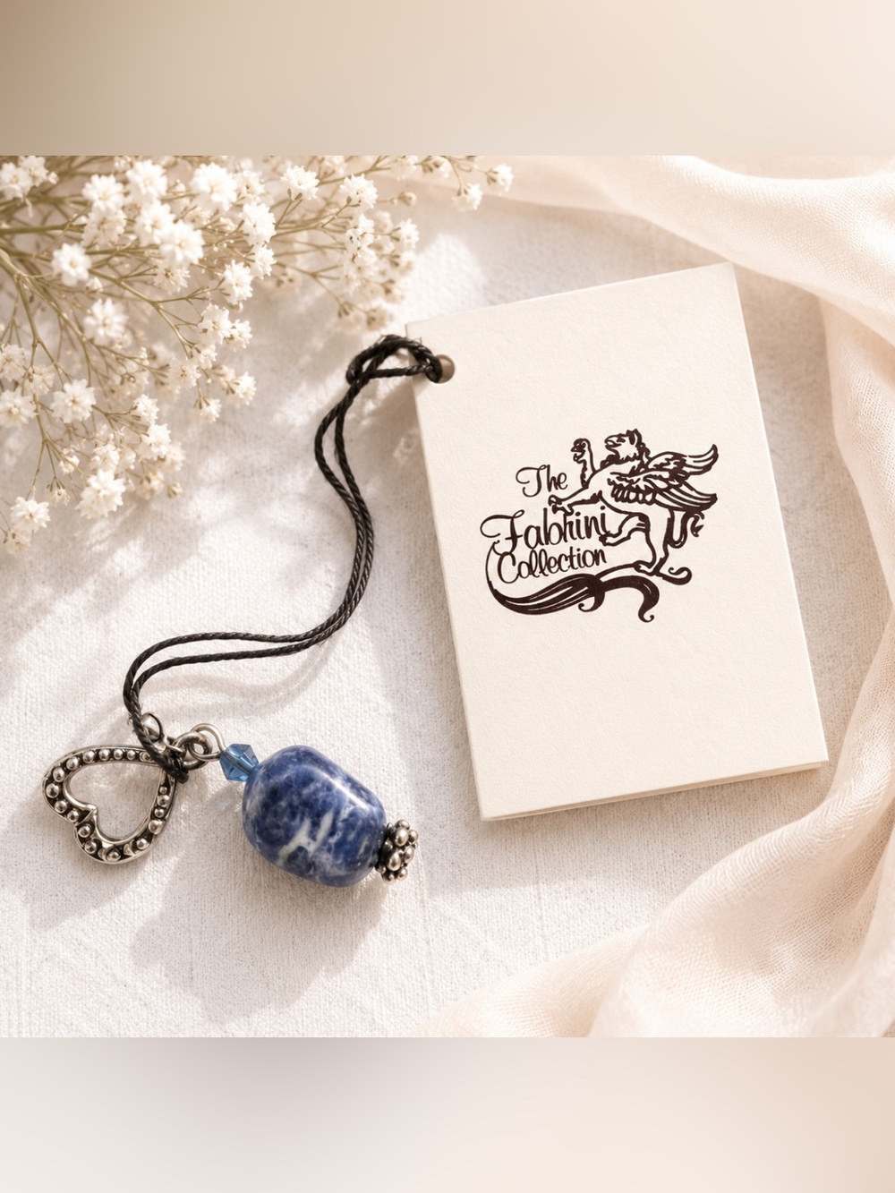The Fabrini Collection featuring a blue sodalite gemstone pendant